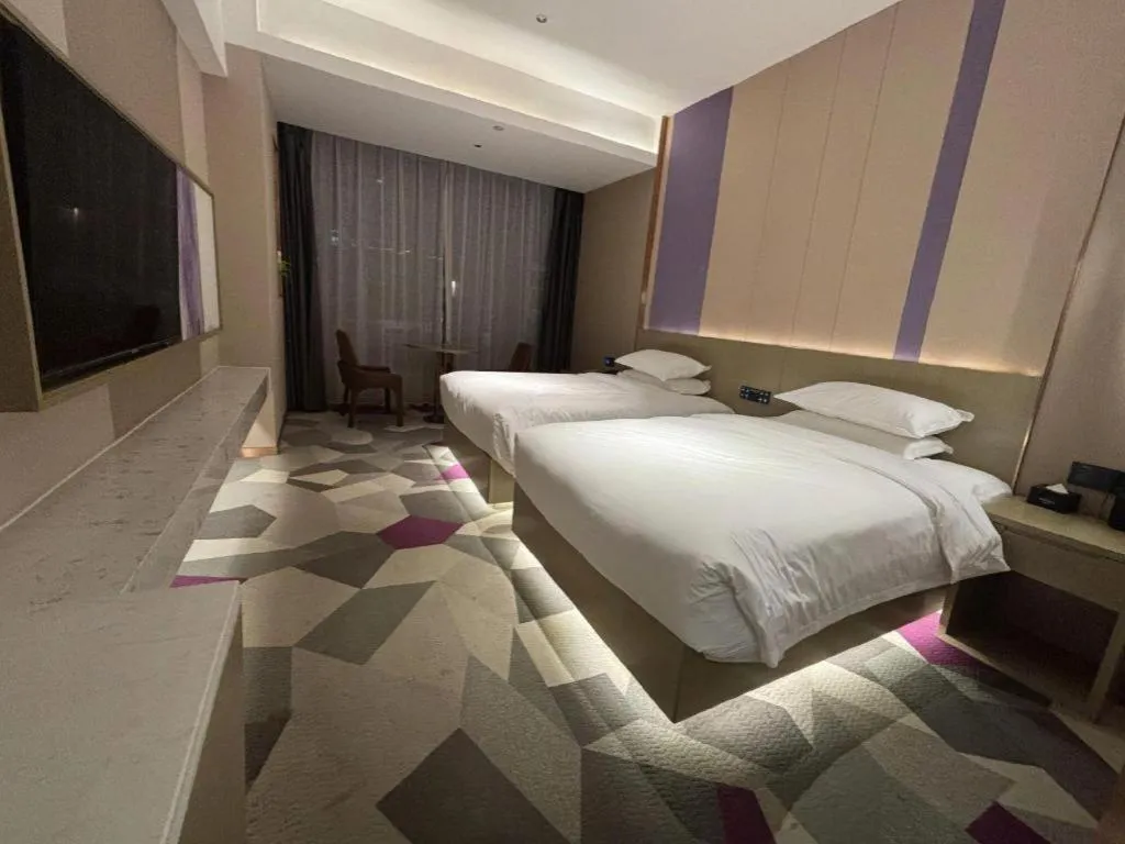 Bed in Borrman Hotel Yongzhou Lingling Ancient Town Government