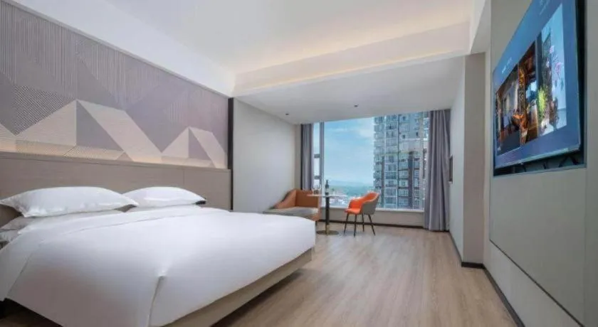 Bed in Borrman Hotel Yongzhou Lingling Ancient Town Government