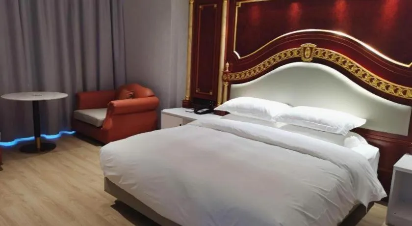 Bed in Borrman Hotel Yongzhou Lingling Ancient Town Government