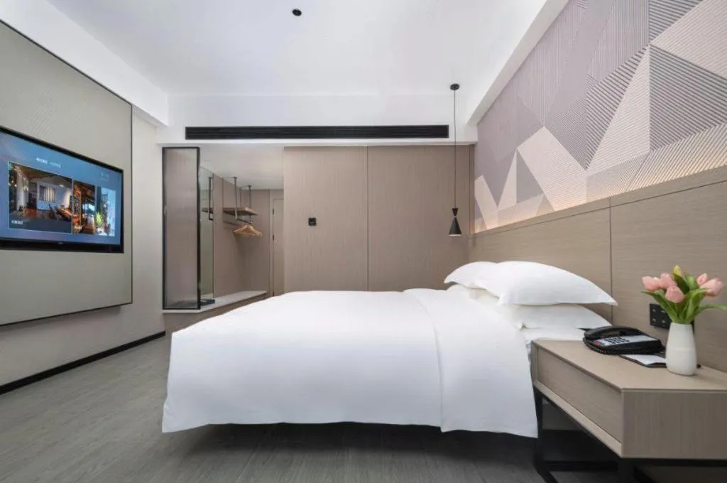 Bed in Borrman Hotel Yongzhou Lingling Ancient Town Government