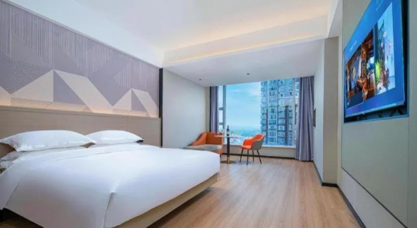 Bed in Borrman Hotel Yongzhou Lingling Ancient Town Government