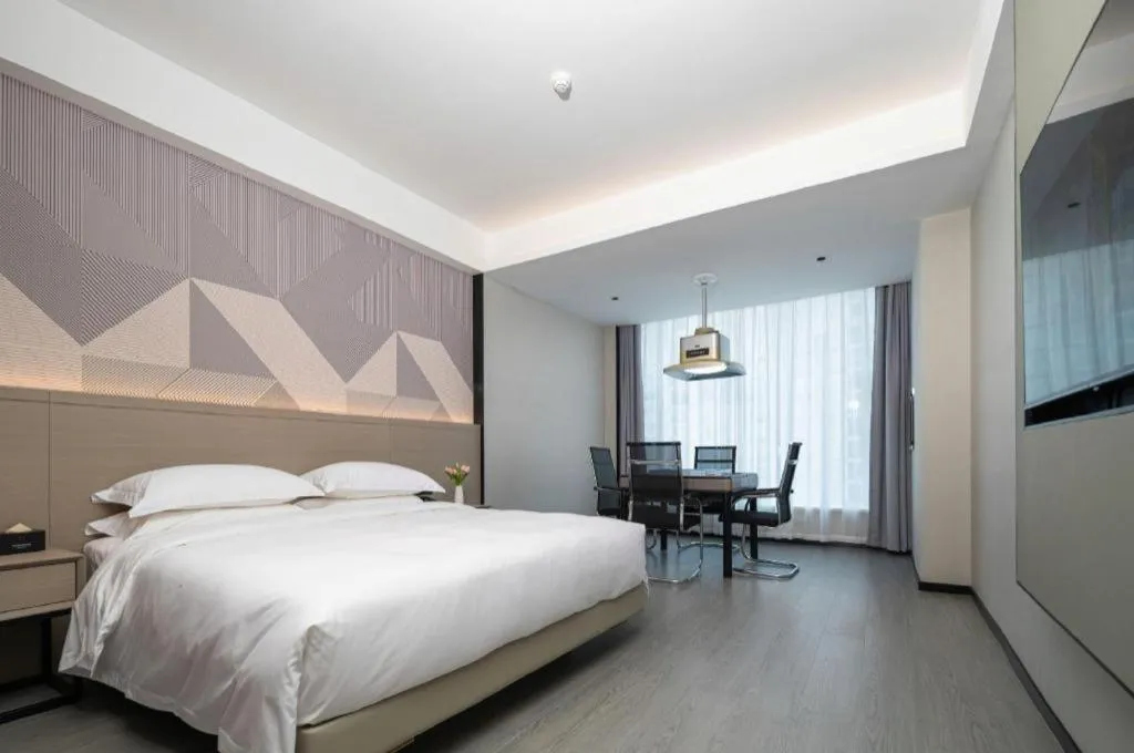 Bed in Borrman Hotel Yongzhou Lingling Ancient Town Government