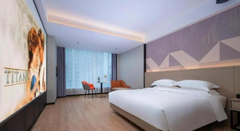 Bed in Borrman Hotel Yongzhou Lingling Ancient Town Government