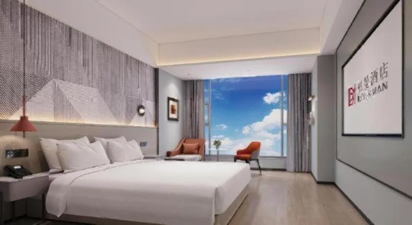 Bed in Borrman Hotel Yongzhou Lingling Ancient Town Government