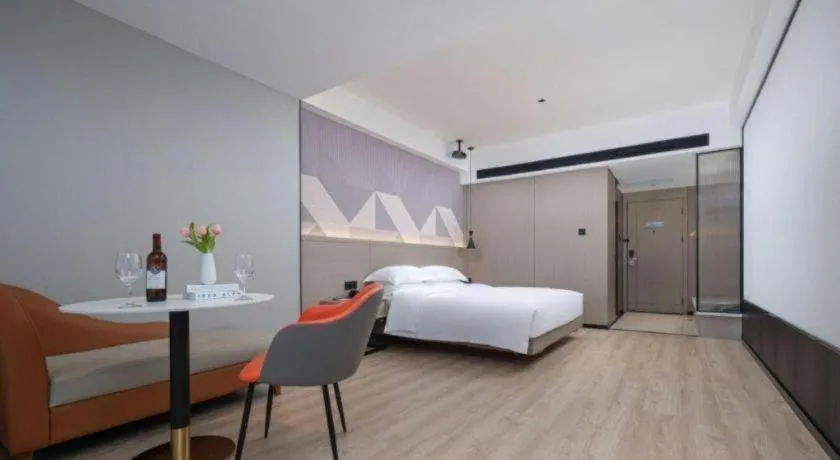 Bed in Borrman Hotel Yongzhou Lingling Ancient Town Government