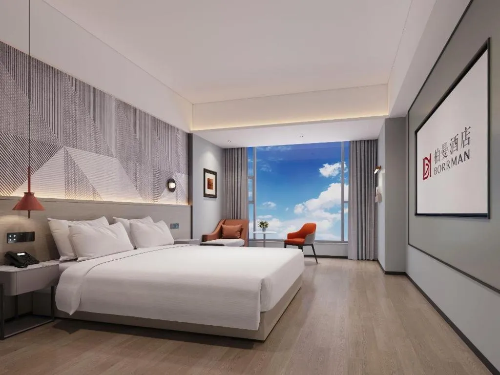 Bed in Borrman Hotel Yongzhou Lingling Ancient Town Government