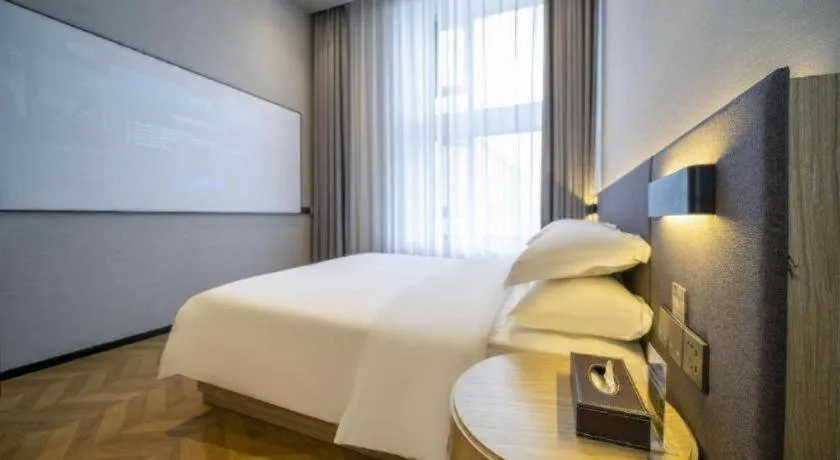 Bed in Borrman Hotel Zhangzhou Baolong Plaza