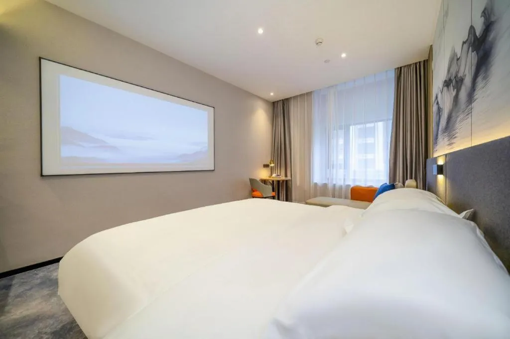 Bed in Borrman Hotel Zhangzhou Baolong Plaza