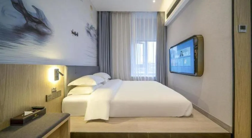 Bed in Borrman Hotel Zhangzhou Baolong Plaza