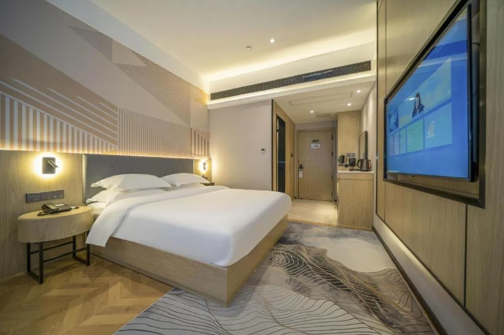 Bed in Borrman Hotel Zhangzhou Baolong Plaza