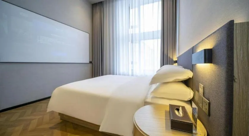 Bed in Borrman Hotel Zhangzhou Baolong Plaza