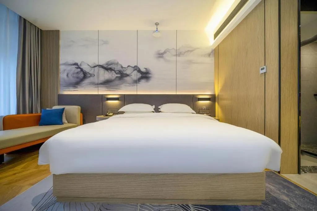 Bed in Borrman Hotel Zhangzhou Baolong Plaza
