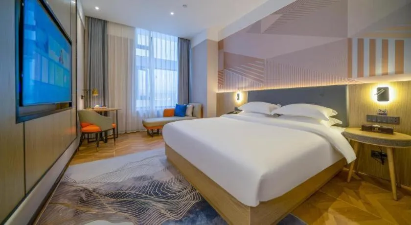 Bed in Borrman Hotel Zhangzhou Baolong Plaza