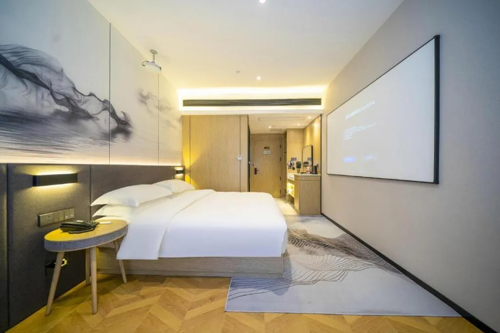 Bed in Borrman Hotel Zhangzhou Baolong Plaza