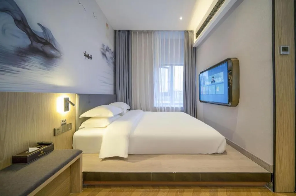 Bed in Borrman Hotel Zhangzhou Baolong Plaza