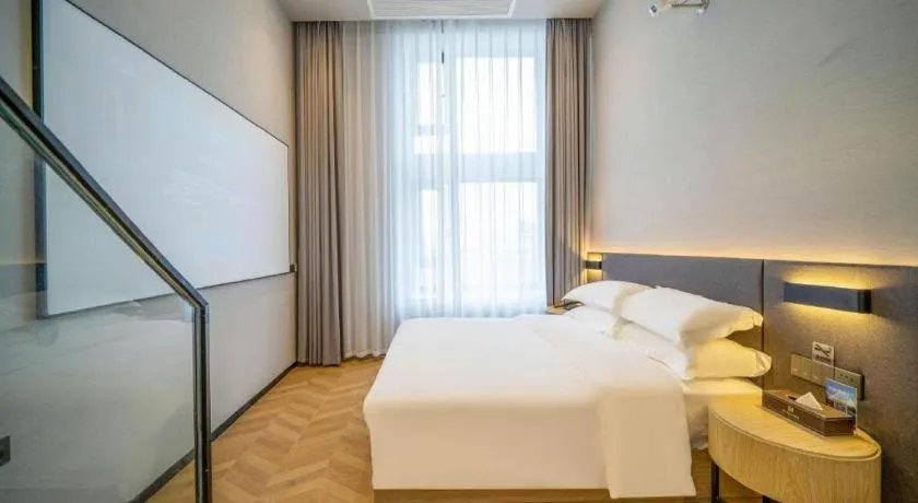 Bed in Borrman Hotel Zhangzhou Baolong Plaza