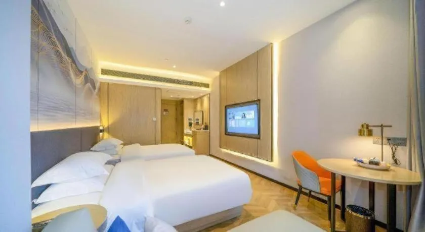 Bed in Borrman Hotel Zhangzhou Baolong Plaza