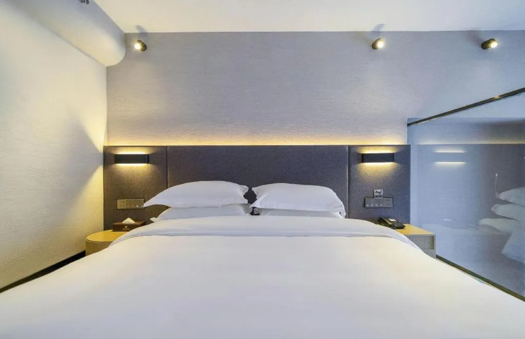 Bed in Borrman Hotel Zhangzhou Baolong Plaza