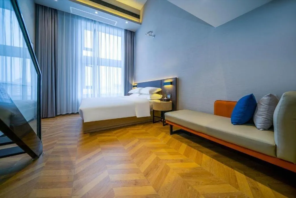 Bed in Borrman Hotel Zhangzhou Baolong Plaza