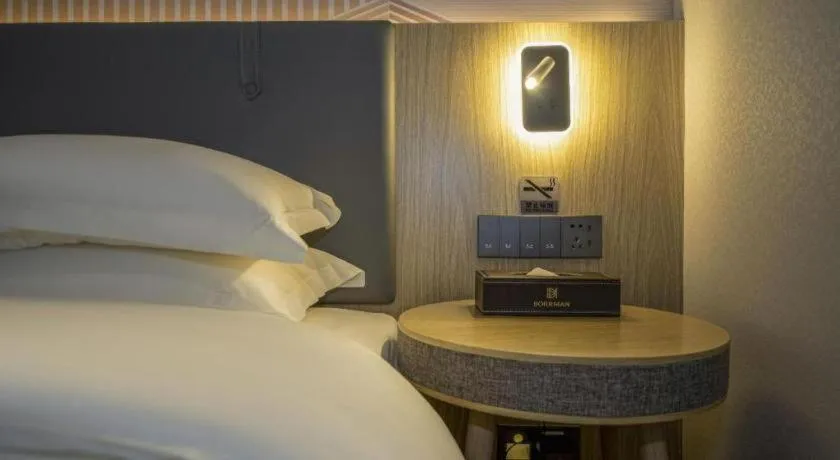 Bed in Borrman Hotel Zhangzhou Baolong Plaza