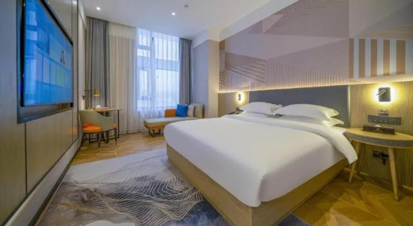 Bed in Borrman Hotel Zhangzhou Baolong Plaza