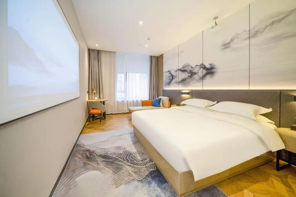 Bed in Borrman Hotel Zhangzhou Baolong Plaza