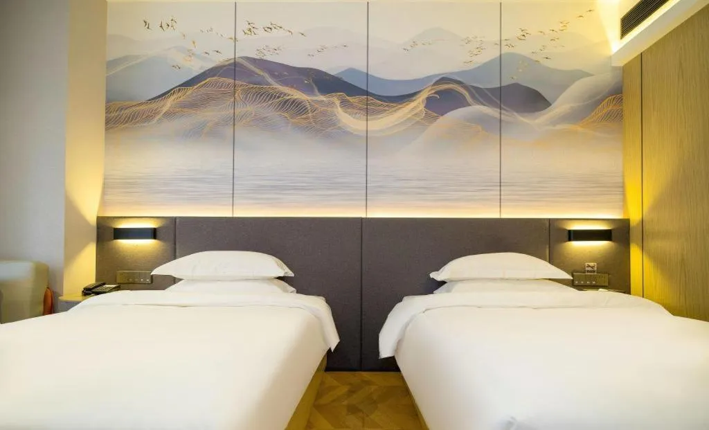 Bed in Borrman Hotel Zhangzhou Baolong Plaza