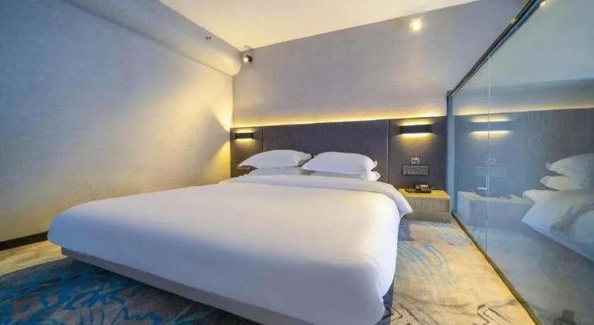 Bed in Borrman Hotel Zhangzhou Baolong Plaza