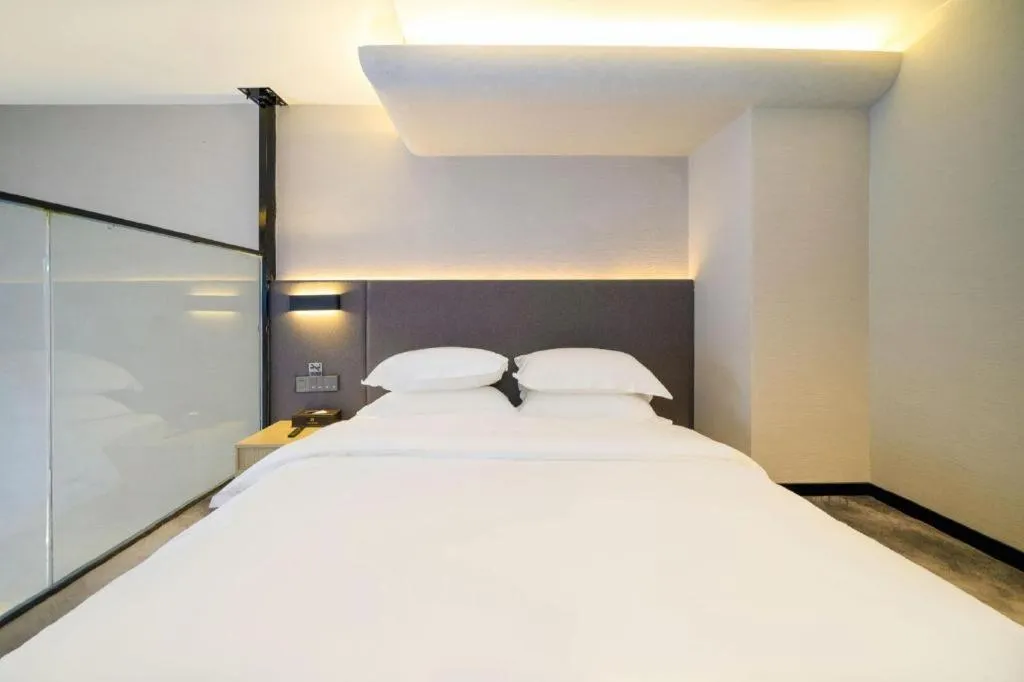 Bed in Borrman Hotel Zhangzhou Baolong Plaza