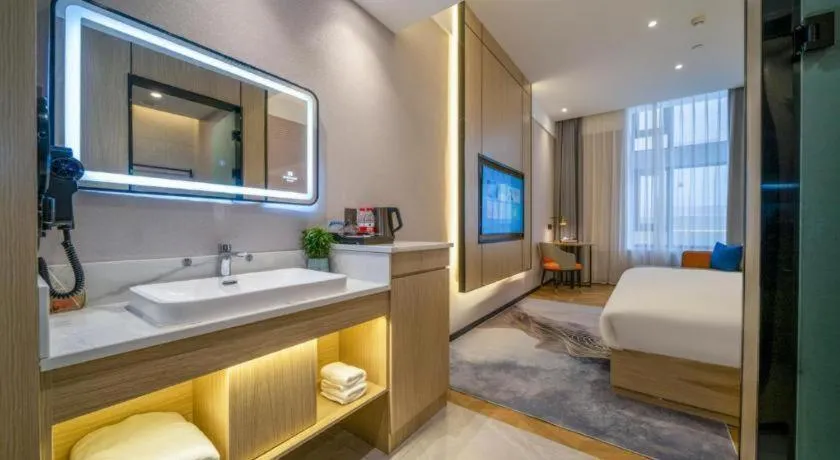 Bed in Borrman Hotel Zhangzhou Baolong Plaza