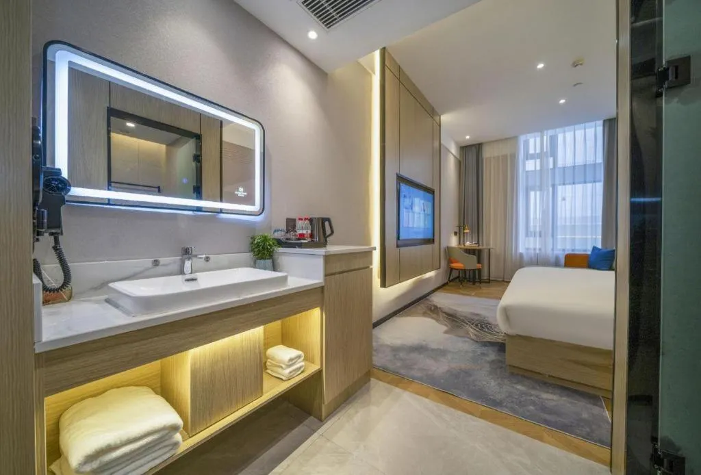 Bed in Borrman Hotel Zhangzhou Baolong Plaza