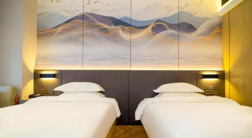 Bed in Borrman Hotel Zhangzhou Baolong Plaza