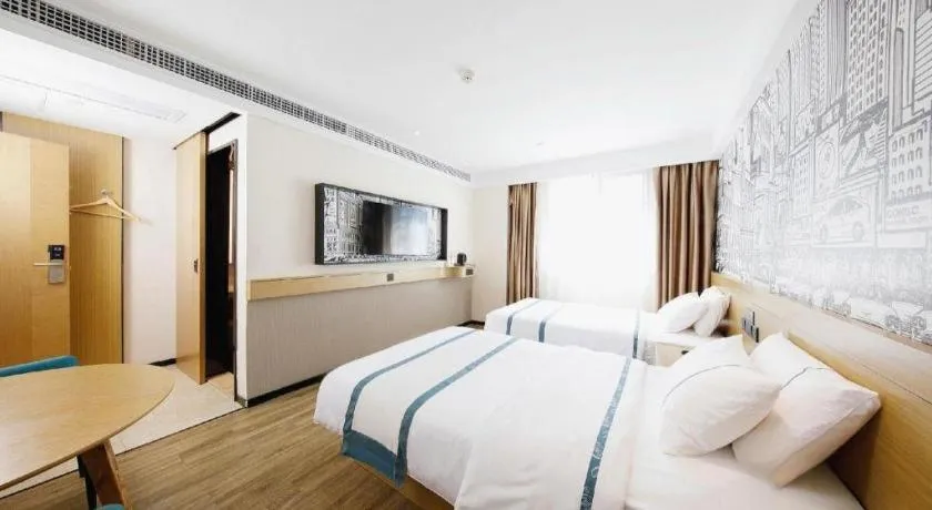 Bed in City Comfort Inn Wuhan Yangtze River Bridge Yellow Crane Tower