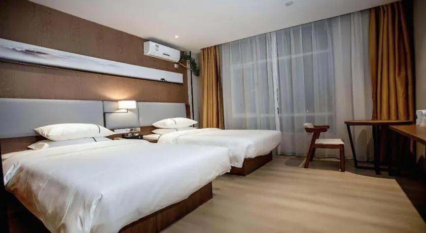 Bed in JTOUR Inn Wuhan Textile University