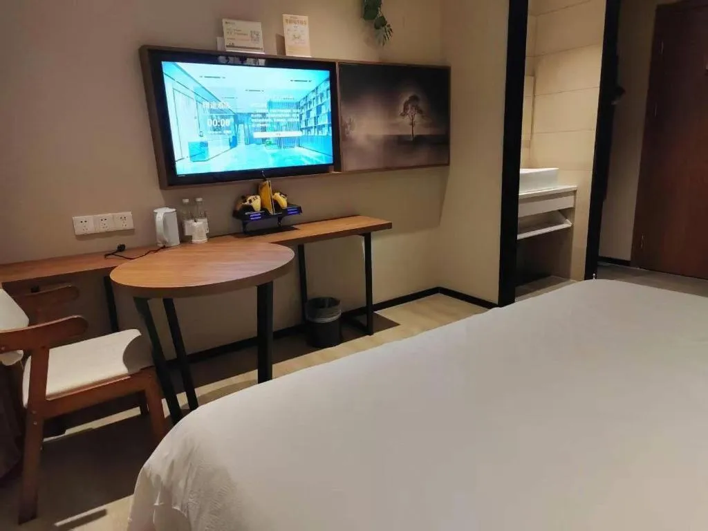 Bed in JTOUR Inn Wuhan Textile University