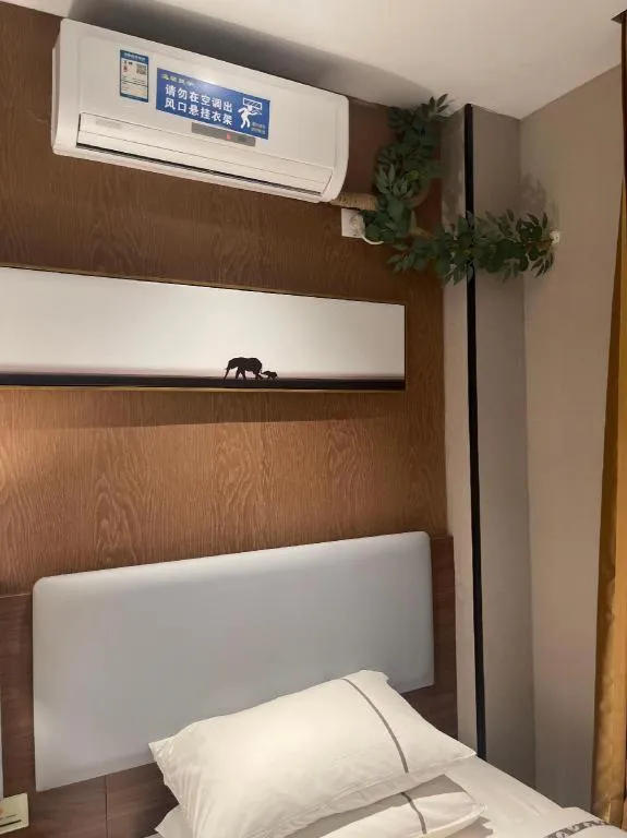 Bed in JTOUR Inn Wuhan Textile University