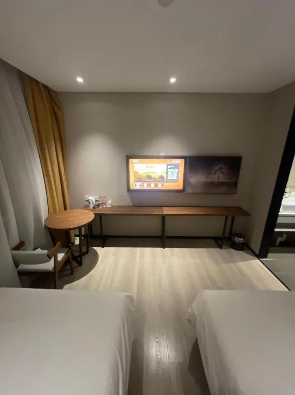 Bed in JTOUR Inn Wuhan Textile University