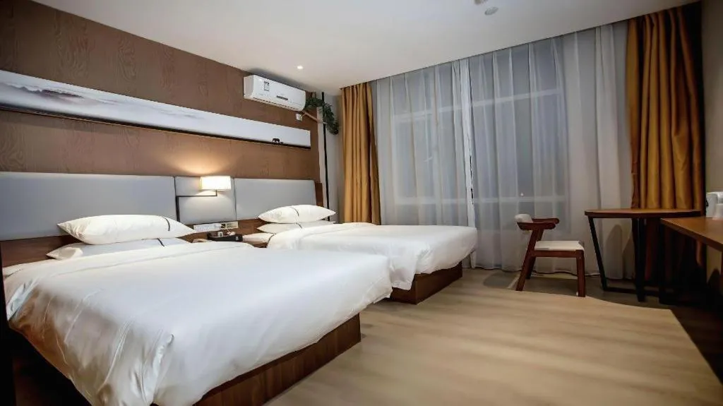 Bed in JTOUR Inn Wuhan Textile University