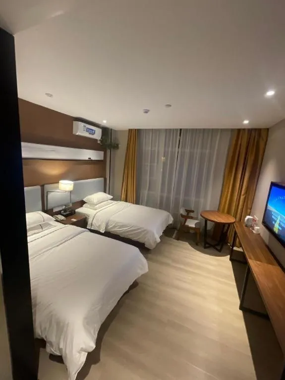 Bed in JTOUR Inn Wuhan Textile University