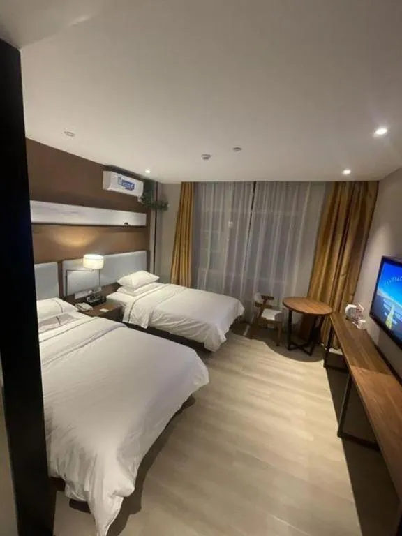 Bed in JTOUR Inn Wuhan Textile University