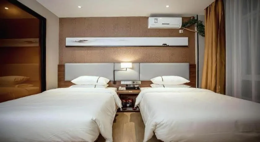 Bed in JTOUR Inn Wuhan Textile University