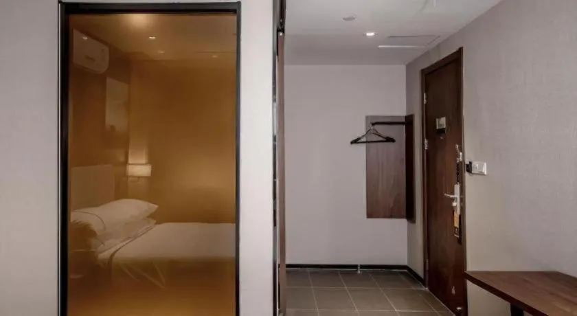 Bed in JTOUR Inn Wuhan Textile University