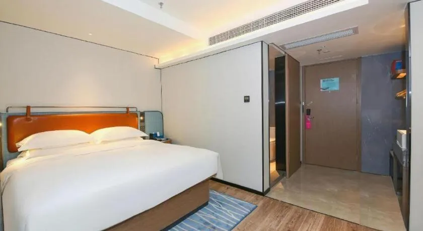 Bed in Echarm Hotel Guangzhou South Railway Station
