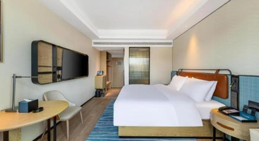 Bed in Echarm Hotel Guangzhou South Railway Station