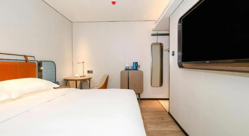 Bed in Echarm Hotel Guangzhou South Railway Station