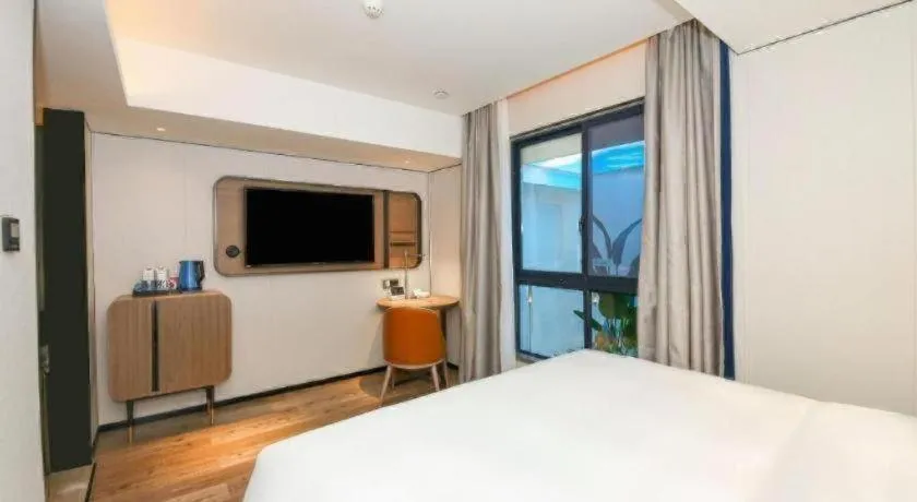 Bed in Echarm Hotel Guangzhou South Railway Station