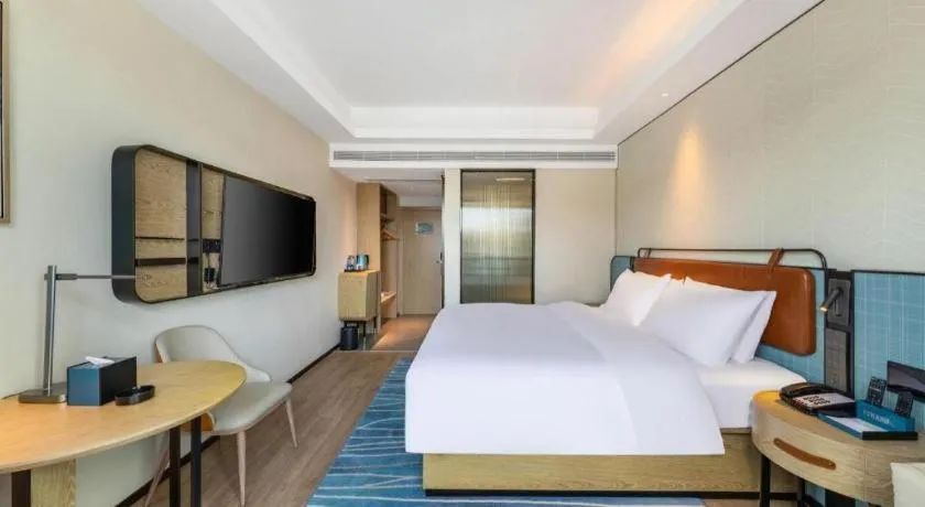 Bed in Echarm Hotel Guangzhou South Railway Station