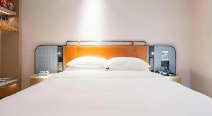 Bed in Echarm Hotel Guangzhou South Railway Station