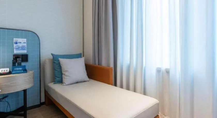 Bed in Echarm Hotel Guangzhou South Railway Station