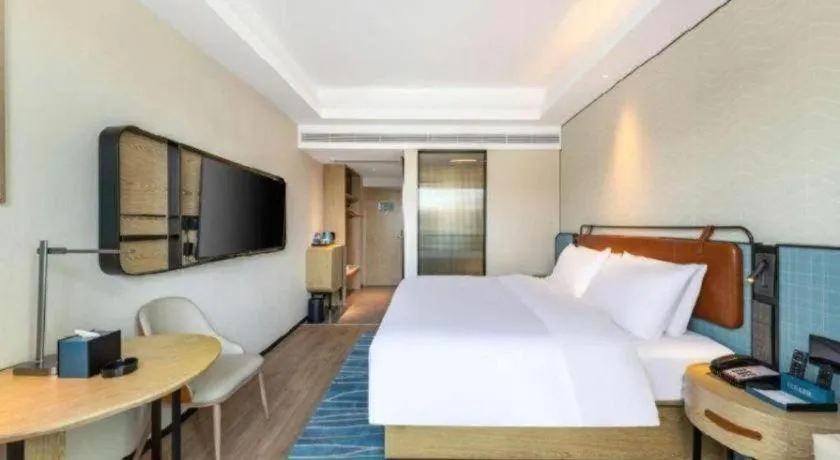 Bed in Echarm Hotel Guangzhou South Railway Station